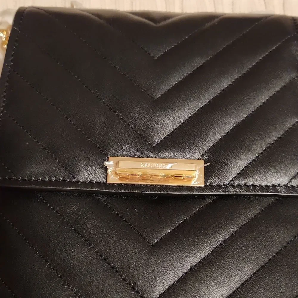 I Zac Zac Posen soft Earthette Convertible black quilted  Leather backpack